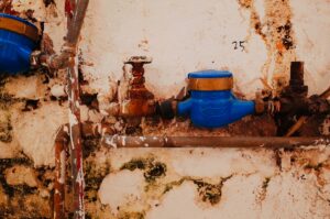 blue propane tank on brown wooden table